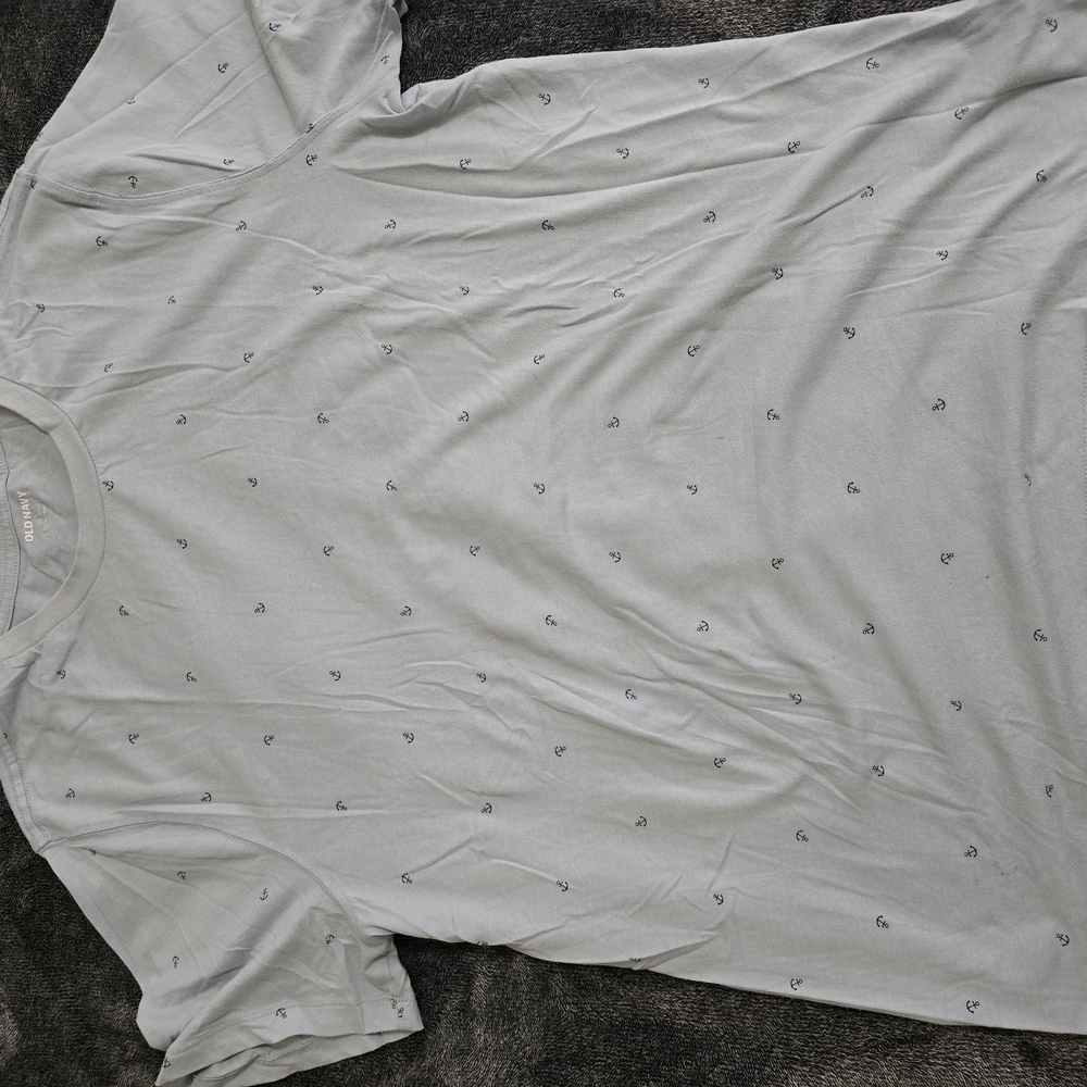 Old NavyMen's Light Blue T-Shirt with a Dark Blue Anchor Pattern.